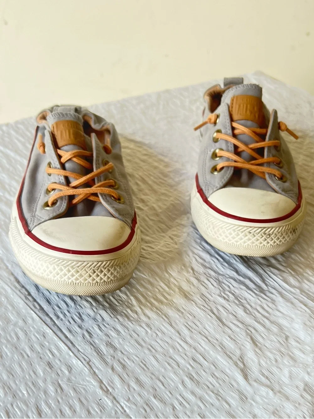 Converse Low-Top Sneakers in Light Gray with Tan and Red Trim